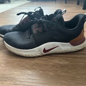 Nike Black and White Shoes with gold and red details